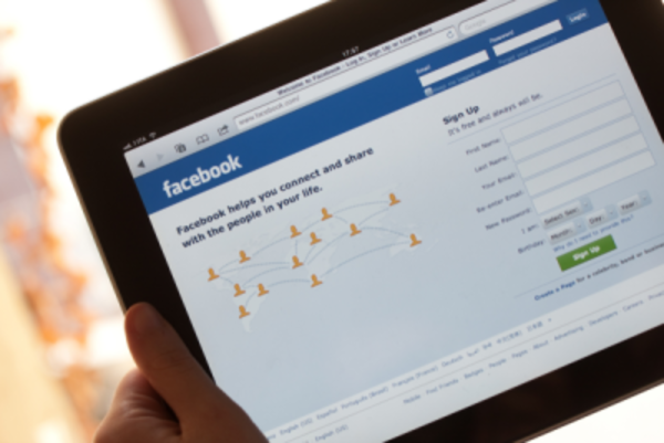 Facebook homepage on mobile tablet.